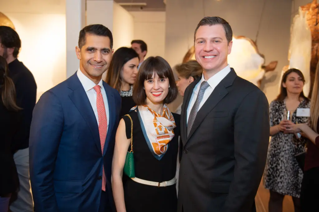 Ahmed Saleh, Megan Brown, Jonathan Ayre at the Houston Symphony Young Associates Council party at Art of the World Gallery (Photo by Wilson Parish)