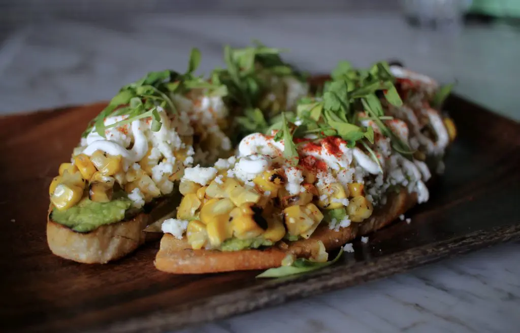 A new twist on the modern favorite finds Avocado toast complimented with zesty flavors.