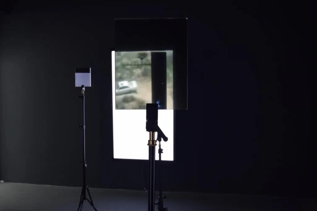 Emmanuel Van der Auwera, Video Sculpture XII (Everything now is measured by after), 2016, 
Triptych of LCD Screens with 8 tripods and plexiglass of varying dimensions, Installation view at BIP- Biennale de l'Image Possible, 2016
