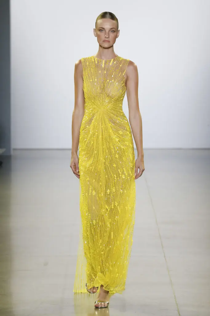 Cong Tri led off his first New York runway show with a glittery yellow gown. Actress Kate Bosworth wore the gown to the Vanity Fair Oscar party. (Photo by Cong Tri)