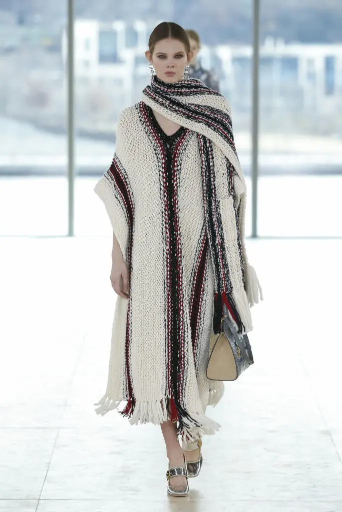 Tory Burch merino wool and cotton poncho, stripe-print crepe de chine skirt (Photo by Tory Burch)