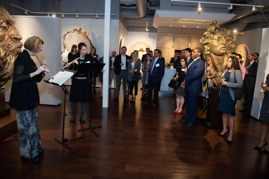 Aralee Dorough and Kathryn Ladner perform at the Houston Symphony Young Associates Council party at Art of the World Gallery (Photo by Wilson Parish)