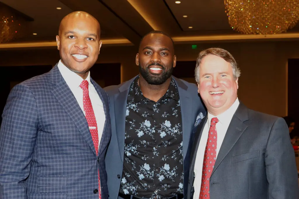 Travis Torrence, Whitney Mercilus and Barrett Reasoner at the Houston Bar Foundation luncheon. (Photo by Debi Wallace, Barfield Photography)