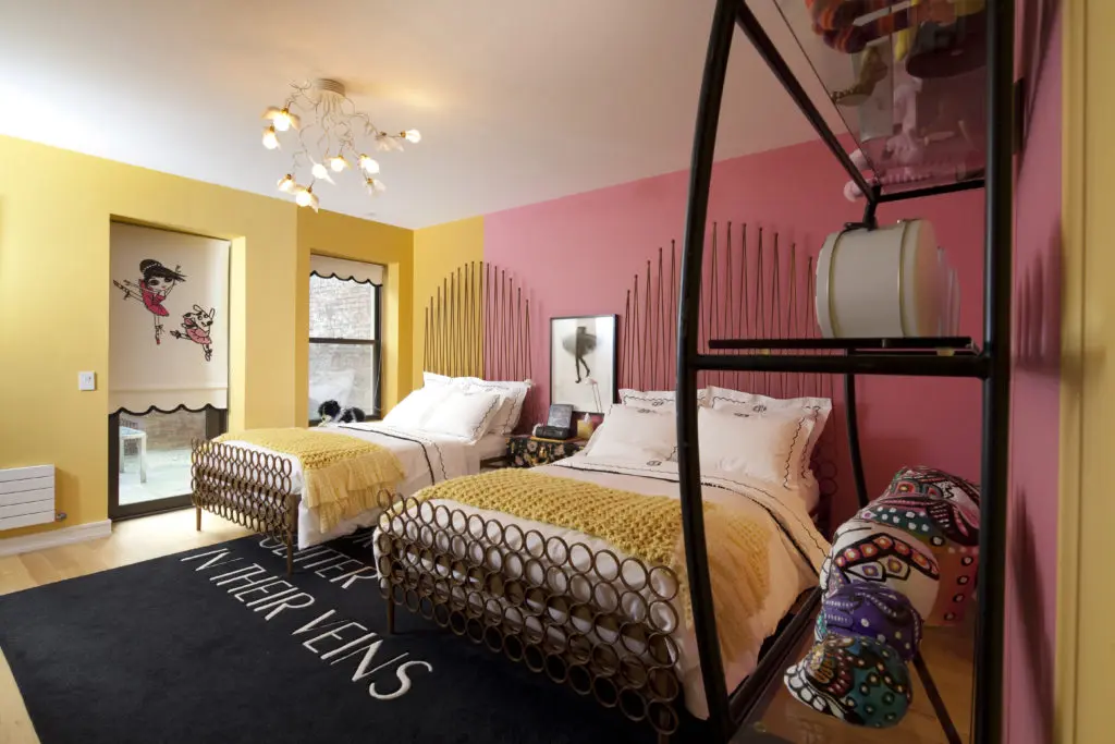 The Loyas' two daughters share a bedroom in the 4,000 square foot dwelling. (Photo by Julie Soefer)