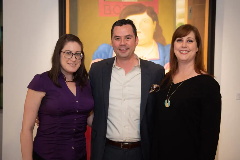 Jenny Stearns, Claudio Gutierrez and Michelle Stair at the Houston Symphony Young Associates Council party at Art of the World Gallery (Photo by Wilson Parish)
