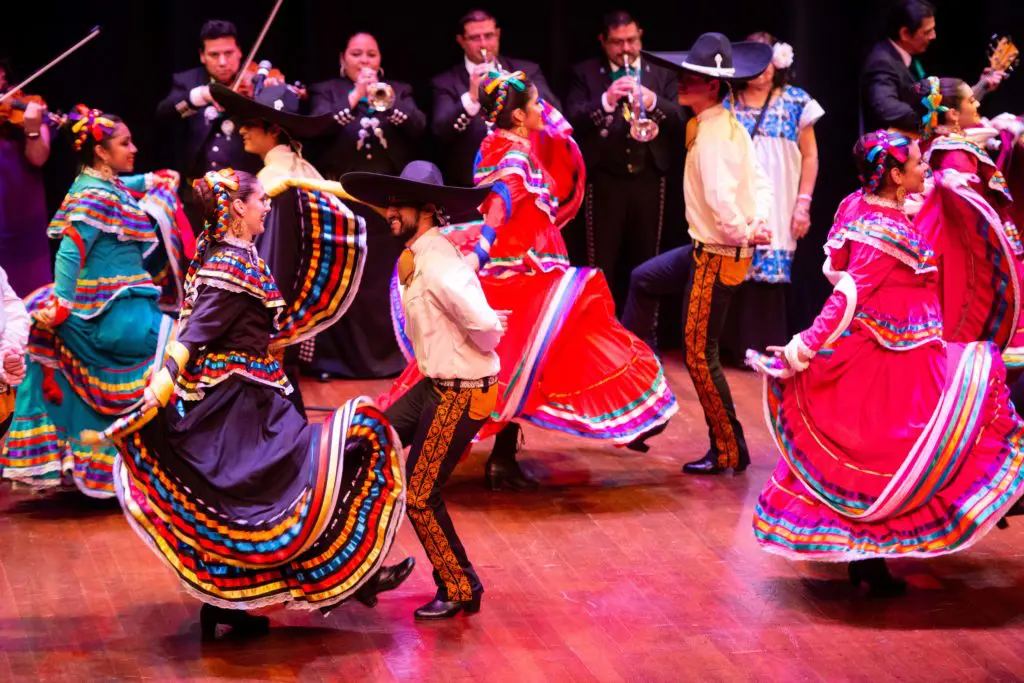 Dancers exult in the Fiesta de Momus theme saluting Mexico at the Knights of Momus ball at The Grand 1894 Opera House in Galveston. (Photo by Michelle Watson/CatchlightGroup.com)