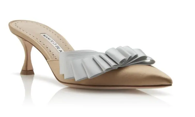 Manolo Blahnik, Finamu
gold satin ribbon detail mules, $825, available at Manoloblahnik.com