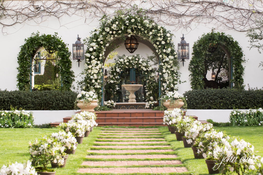 The brides's childhood home is a gorgeous, sprawling Spanish Colonial.  (Photo by John Cain Photography)