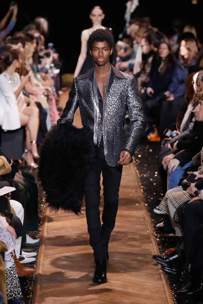Model Alton Mason channels the '70s disco era in a Michael Kors metallic print jacket. (Photo by JP Yim/Getty Images for Michael Kors)