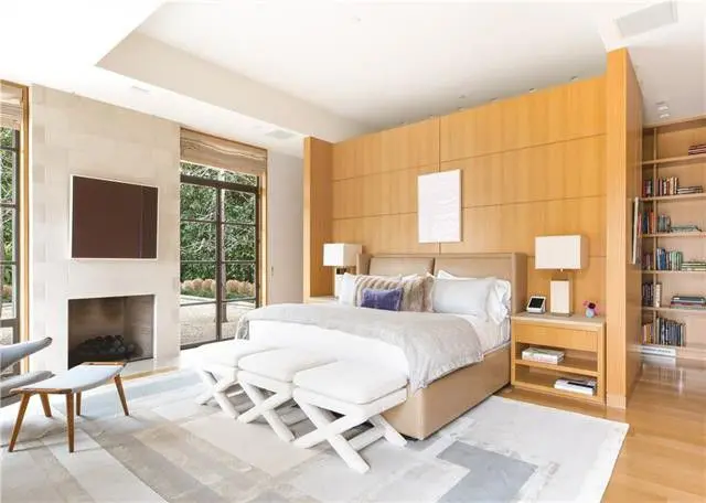 The home has three bedrooms, four full baths and two half baths. 