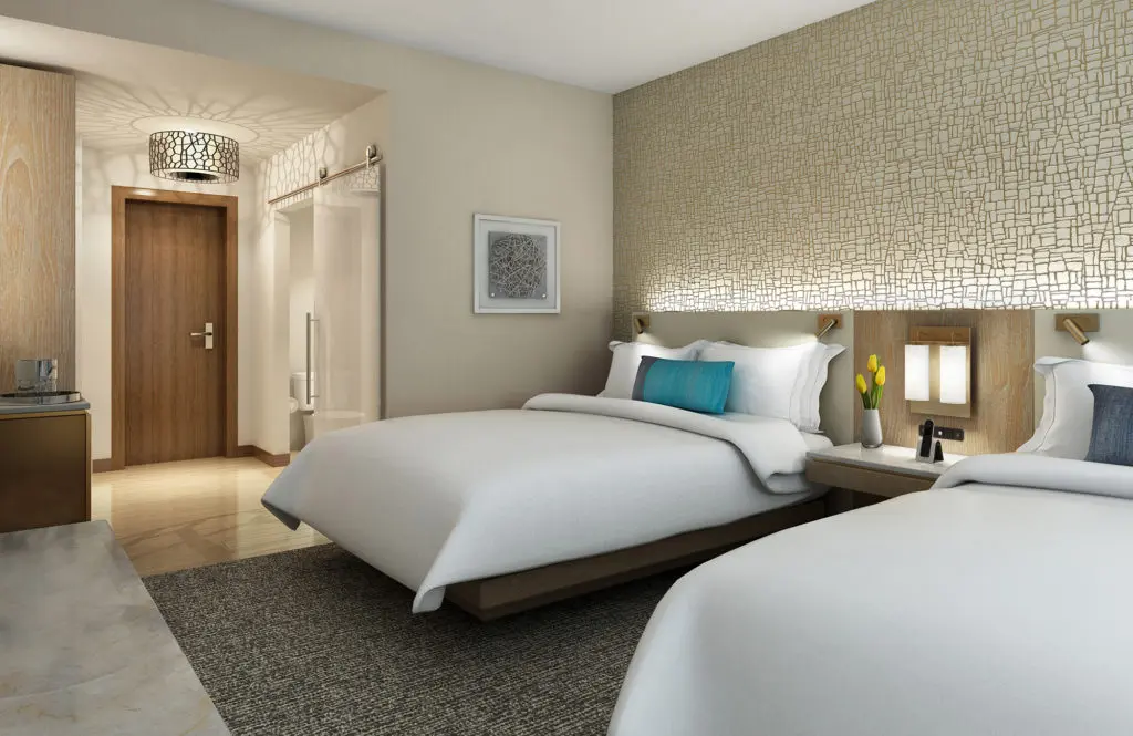 Rendering of a hotel room, Westin Houston Medical Center. The hotel brand favors subtle natural materials and warm textures in the rooms, with art reserved for the public spaces. 