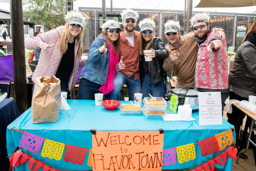 Chili fans Alexis Kramer, Emma McCarthy, Lizzie Prochazka, Matt Prochazka, Ethan Miller, Brandon Kattner at the Casa de Esperanza Young Professional's chili cookoff at Kirby Ice House (Photo by Meredith Flaherty Photography)