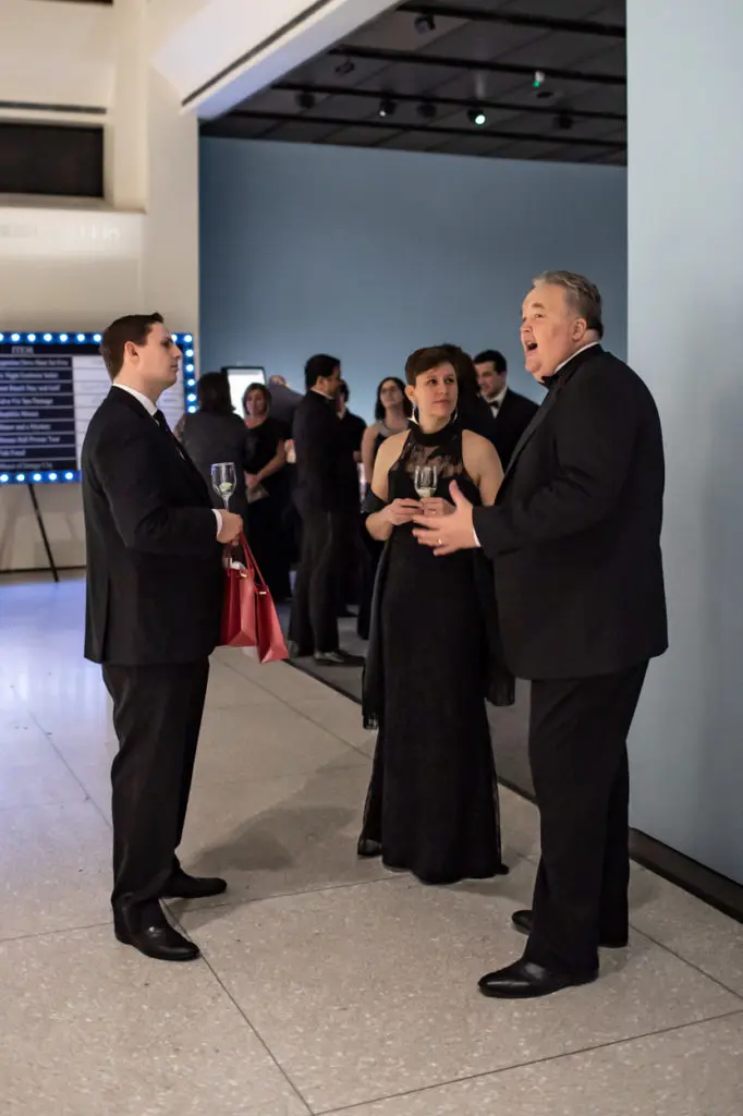 Museum director and gala chair Joel Bartsch, right, visits with guests at the Houston Museum of Natural Science gala, held at the museum. (Photo by Mike Rathke)