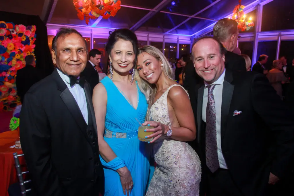 Suresh and Renu Khator with Corina Tomas and Dana Holgorsen at the San Luis Salute  in Galveston.  (Gary Fountain Photo)