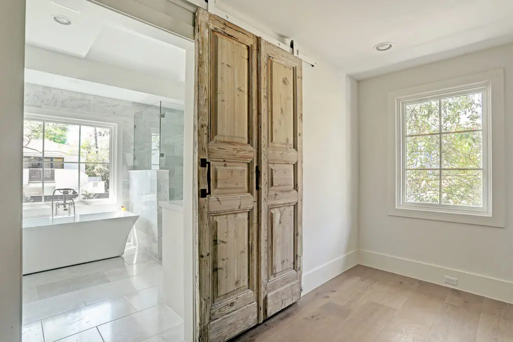 A sitting area off the master leads to the bath.