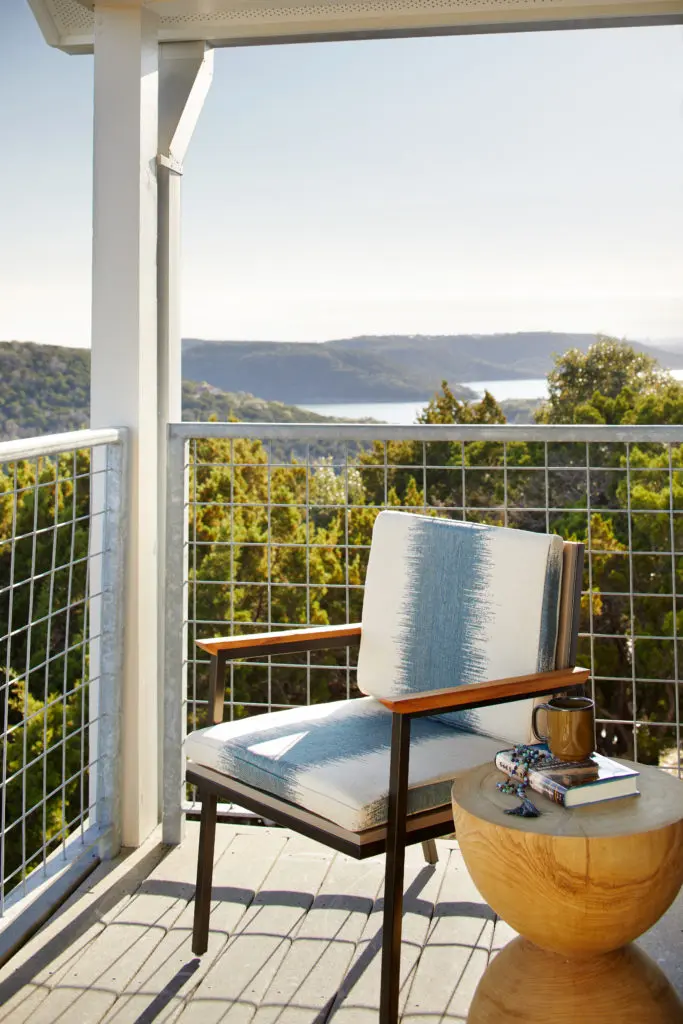 Each room and suite at Miraval Austin has a balcony overlooking the rolling landscape of oaks and cedars. (Photo by James Baigrie for Miraval Austin)