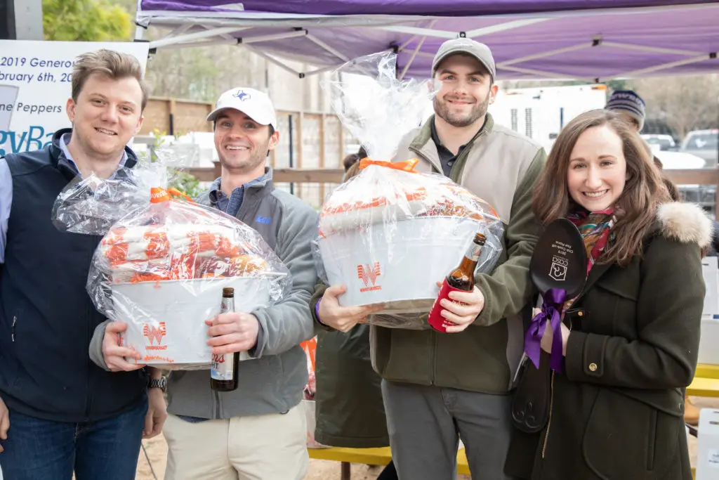 Winning chili cooks John Serice, Robert Gardner, Jeff Mraz, Nealy Stuckey at the Casa de Esperanza Young Professional's chili cookoff at Kirby Ice House. (Photo by Meredith Flaherty Photography)