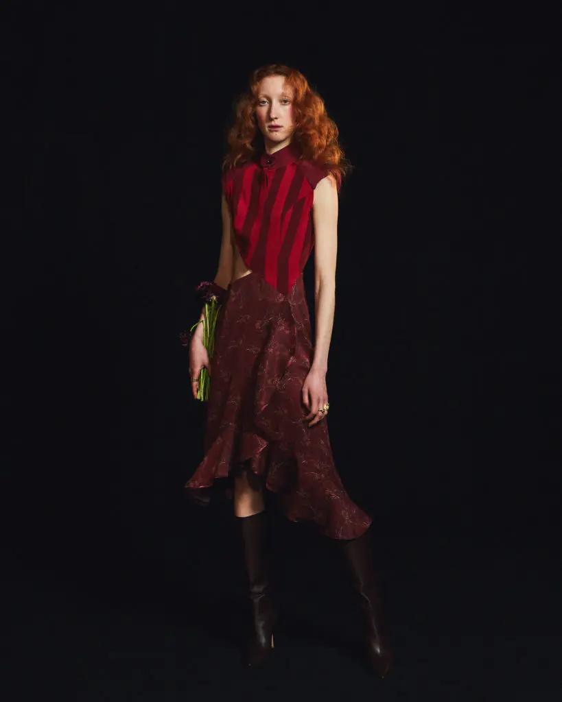 Amir Taghi striped vest blouse and embroidered skirt with ruffle detail at hemline. (Photo by Amir Taghi)