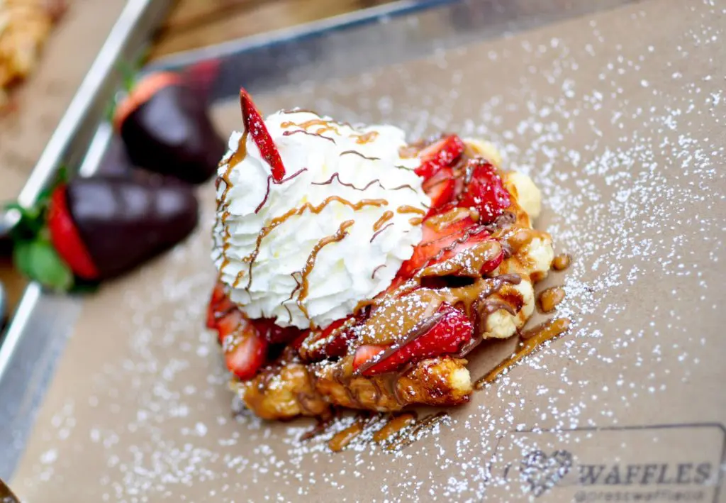 "The House" is one of Press Waffle Co.'s most popular waffles with strawberries, Nutella, whipped cream, and cookie butter drizzle. Courtesy of Press Waffle Co.