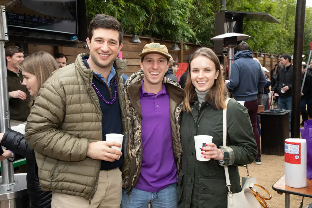 Paul Domingue, Bradon Eddy, Emily Barnes at the Casa de Esperanza Young Professional's chili cookoff at Kirby Ice House. (Photo by Meredith Flaherty Photography)