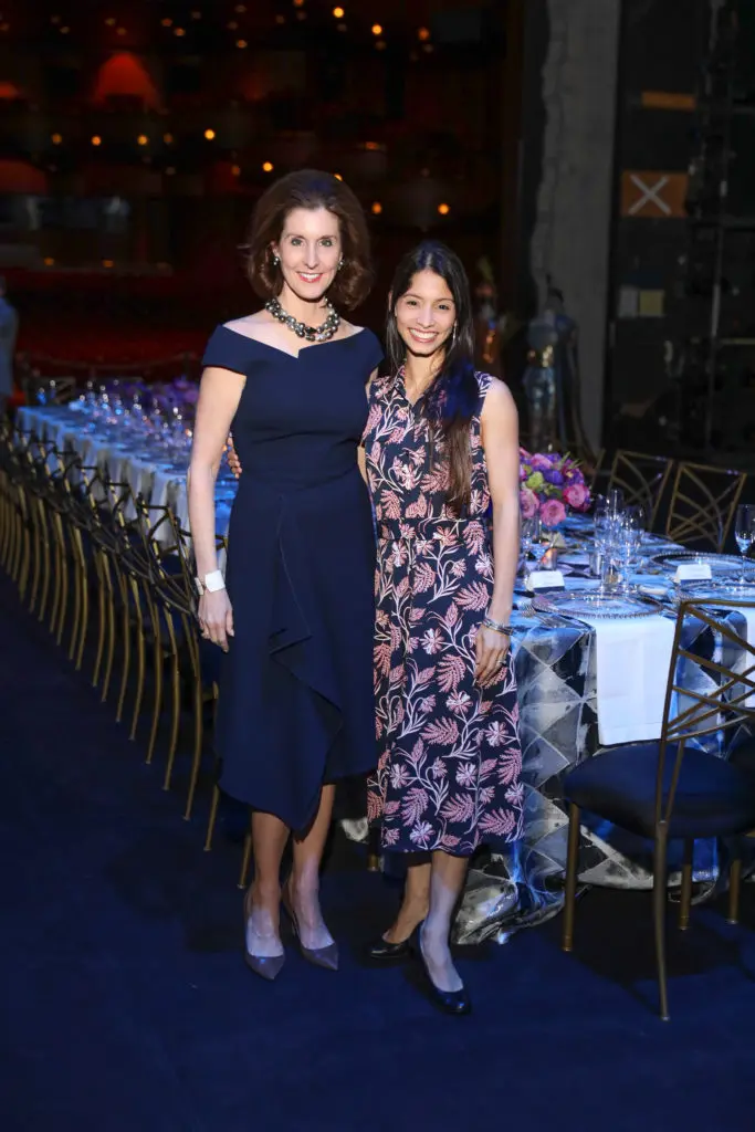 Phoebe Tudor, Karina Gonzalez at the Houston Ballet underwriter dinner on stage at Wortham Theater Center celebrating world premier of 'Sylvia.' (Photo by Priscilla Dickson)
