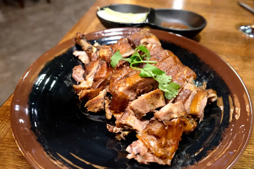  Wula Buhuan's smoked duck is one of the new Houston restaurant's more traditional dishes. (Photo by Mai Pham)