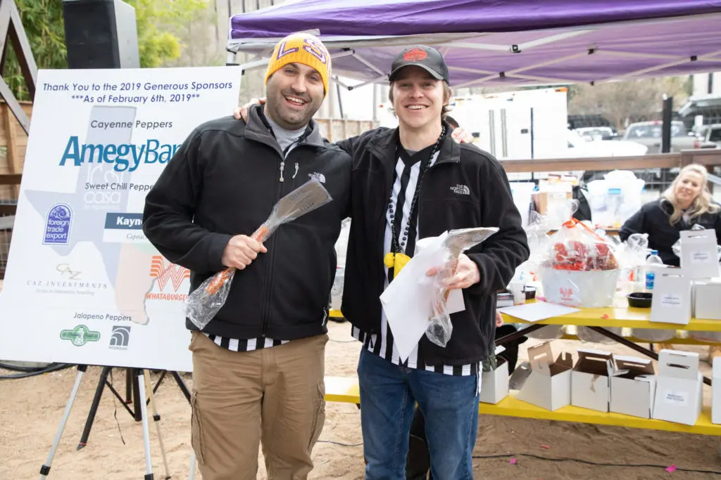 Tin Roof Brewery team members at the Casa de Esperanza Young Professional's chili cookoff at Kirby Ice House. (Photo by Meredith Flaherty Photography)