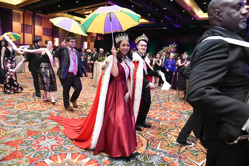 Students Erin Vallagomesa and Richie Nguyenphat at the University of St. Thomas Mardi Gras ball 2019.