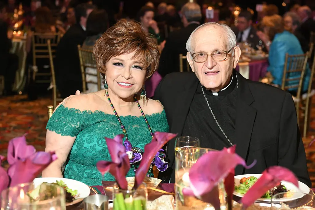 Philanthropist Trini Mendenhall and Archbishop Emeritus Joseph Fiorenza at the University of St. Thomas Mardi Gras ball.