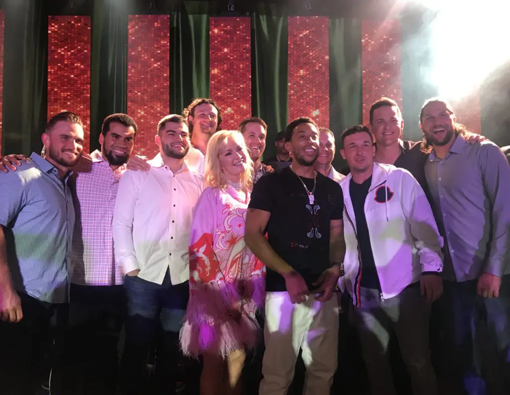 Whitney Crane and Ludacris on stage at her birthday party in Palm Beach, Florida. (Photo by Oona Beyer, Dragonfly Photography)