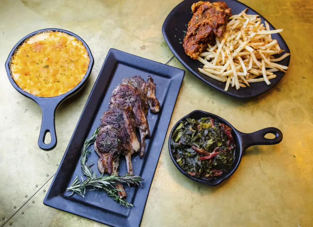 The menu goes beyond waffles, like jerk lamb chops, shrimp and grits and smoked Gouda mac and cheese.  (Photo by Jeremiah Jones)