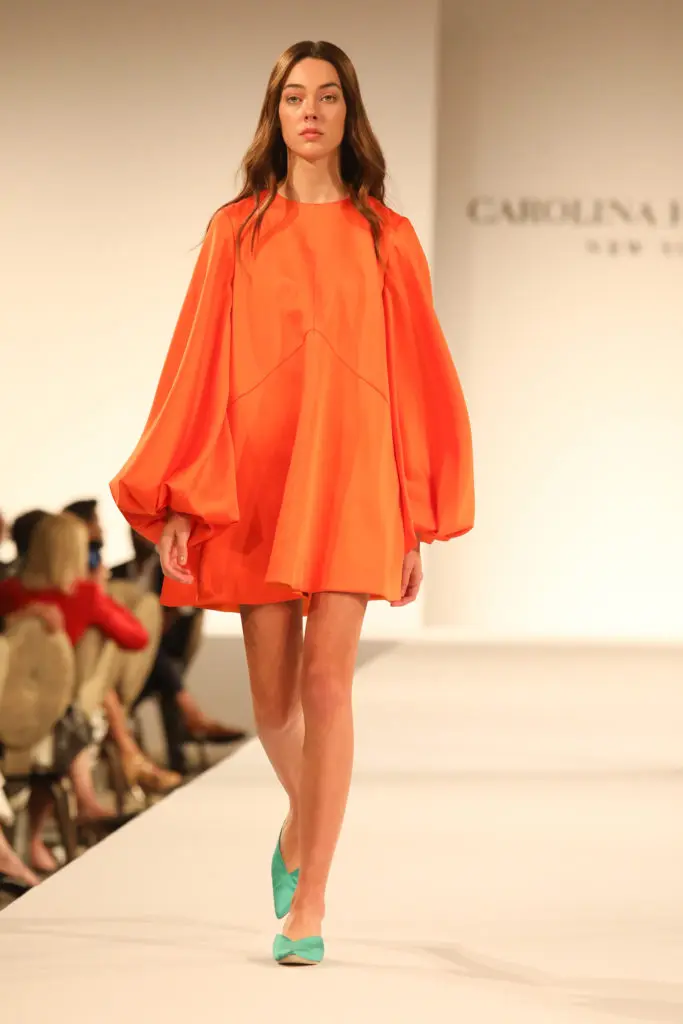 Carolina Herrera bright orange puff-sleeve minidress.  (Photo by Priscilla Dickson Photography)