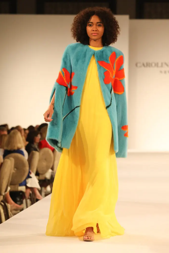 Carolina Herrera sunshine yellow evening gown and floral print fur cape jacket. (Photo by Priscilla Dickson Photography)