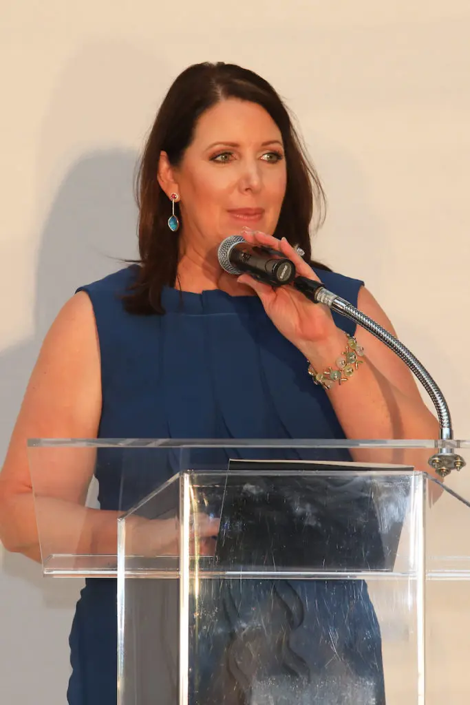 Elizabeth Anthony owner Julie Roberts talking Jason Wu fashion at the Children's Assessment Center Spirit of Spring luncheon.