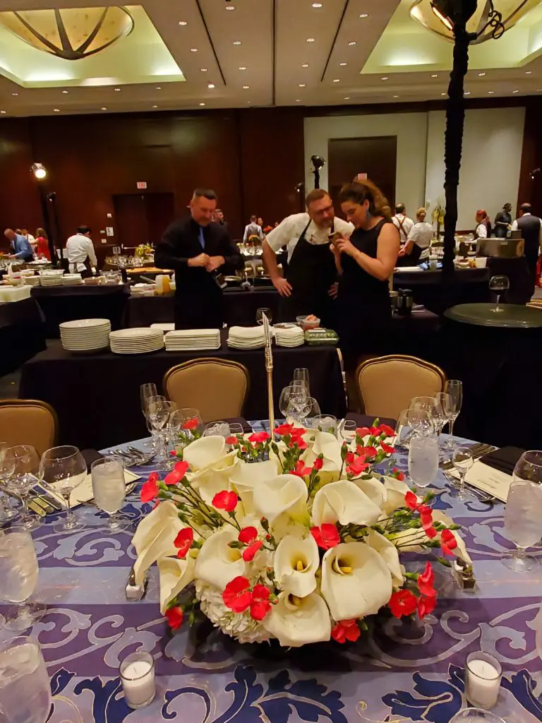 Tables are decorated with lavish floral arrangements at the Youth Development Center Bon Vivant dinner. (Photo by Shelby Hodge)