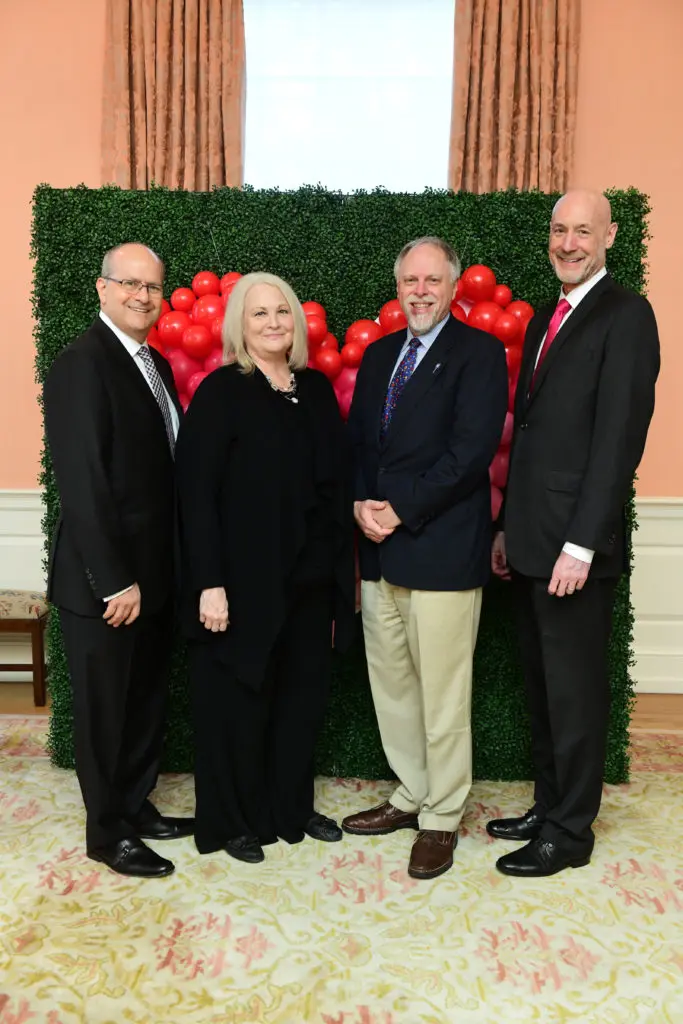 Ken Wells, Marilyn Gambrell, Dr. Chris Greeley, Rob Wisner at the Cherish Our Children International luncheon. (Photo by Daniel Ortiz)