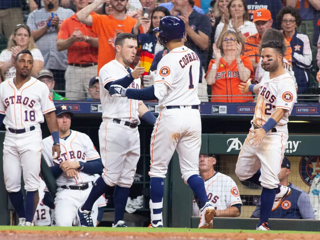 Carlos Correa's teammates are as excited about his return to form as he is. (Photo by F. Carter Smith)
