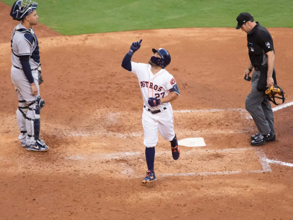 Jose Altuve pointed to the sky after depositing a home run on the train tracks. (Photo by F. Carter Smith)