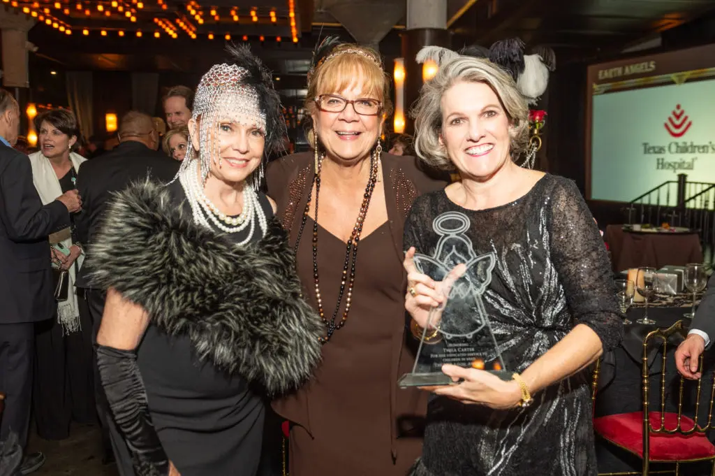 Dot Cunningham, Marti Boone, Twila Carter at the Be an Angel gala.  (Photo by Fulton Davenport, PWL Studio)