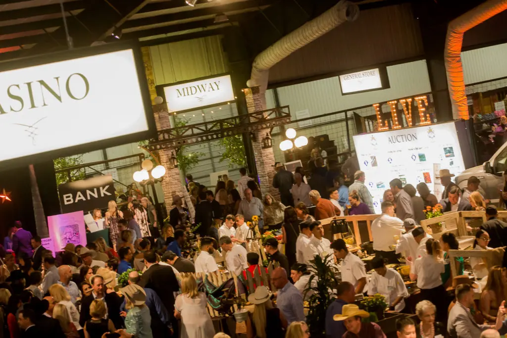 The crowd scene at the Houston Cattle Baron's Ball at the George Ranch. (Photo by Mike Charlton)