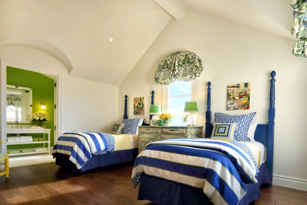 The blue-green bedroom at the Corona del Mar home designed by Bill Stubbs for a couple from San Antonio.