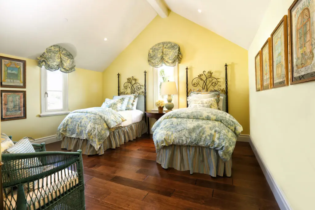 The yellow bedroom at the Corona del Mar home designed by Bill Stubbs for a couple from San Antonio.