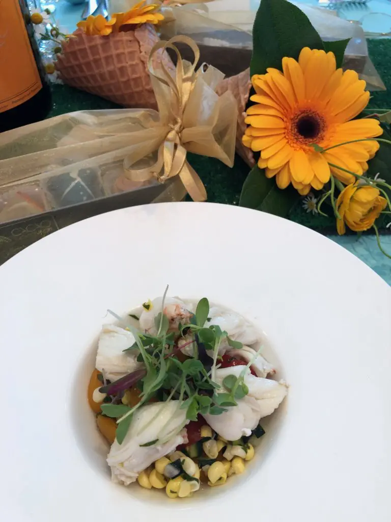 Balthazar Cellars chef Teague Burrell's first course: colossal lump crab served atop a sweet corn relish with basil and meyer lemon gastrique. (Photo by Shelby Hodge)