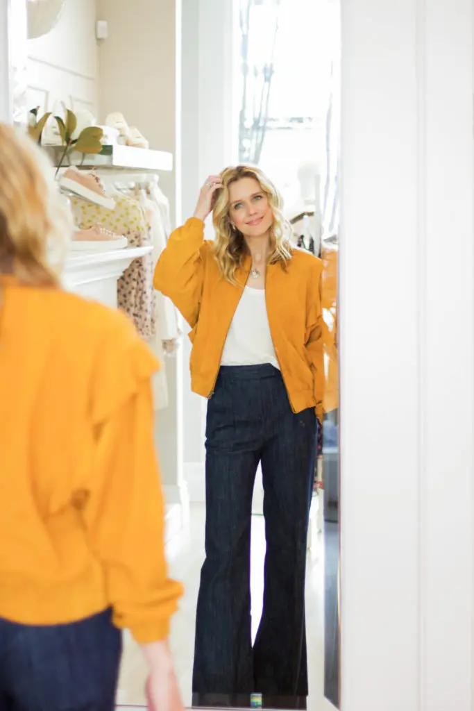 Zorich suggests easing into mustard with dark flared denim.