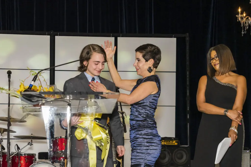 Max Harrison, Tricia Bonilla Harrison, emcee Deborah Duncan  at the Joe Niekro Foundation Knuckle Ball. (Photo by Nikki Rosenberg)