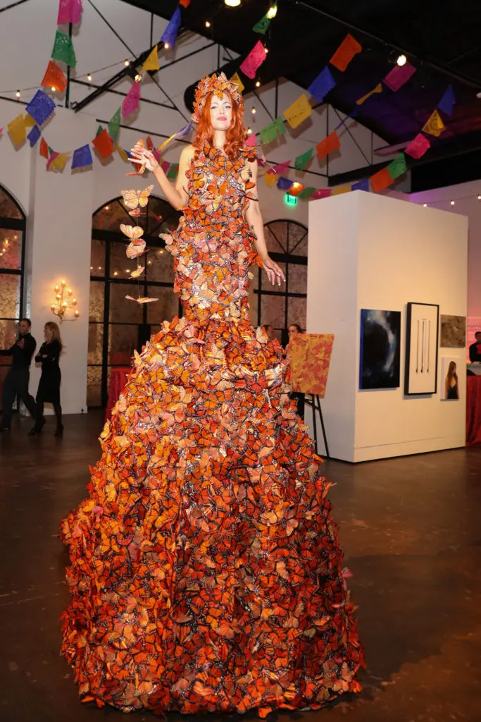 A gown of Monarch butterflies adds a vibrant touch to the Houston Grand Opera Ball. (Photo by Priscilla Dickson)