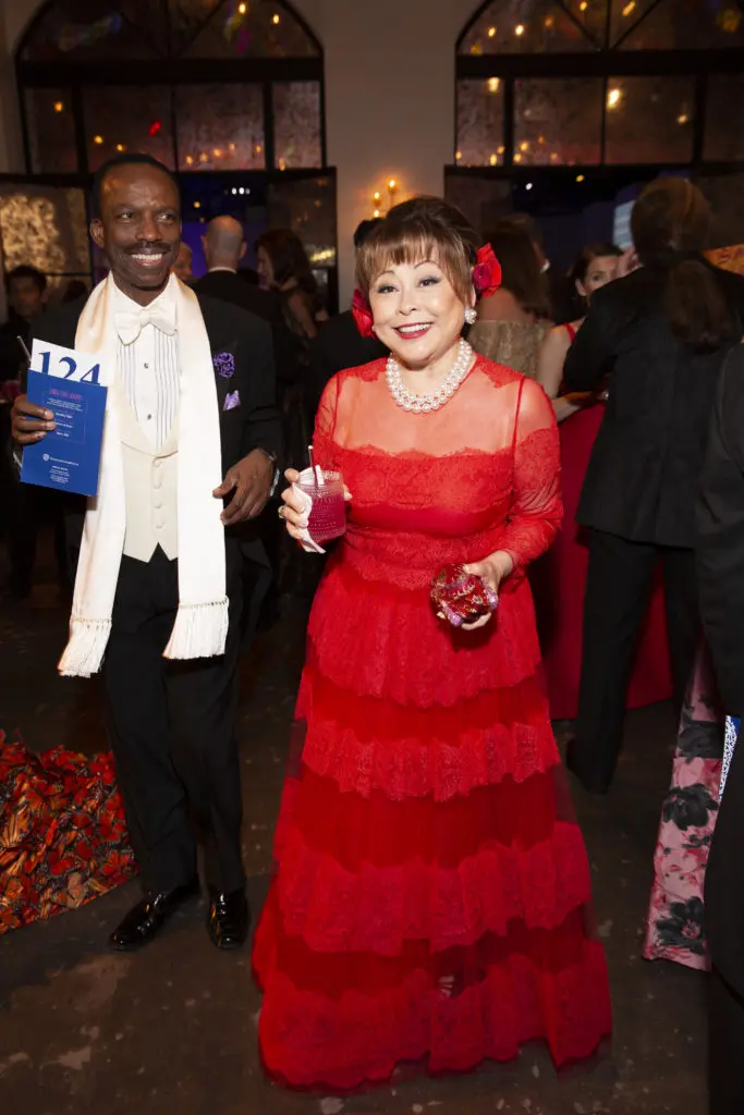 Rini Ziegler chose a red Valentino lace gown to the Houston Grand Opera Ball. (Photo by Jenny Antill)