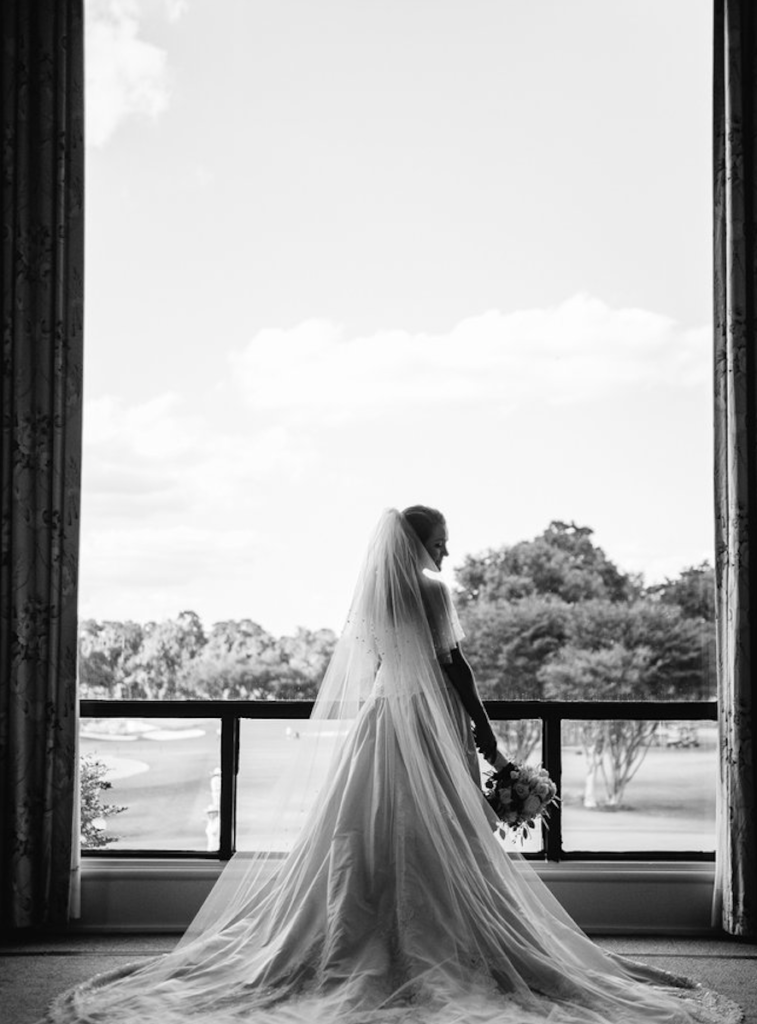 Emily updated her mother's wedding dress for the big day.  (Photo by Chris Bailey )