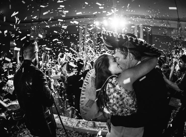 This wedding was a marriage of sophistication and all-out fun.  (Photo by Chris Bailey )