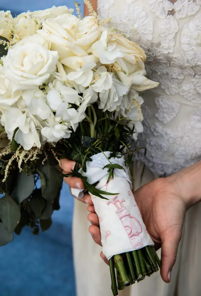 The kerchiefs wrapped around Emily's bouquet were her something borrowed.  (Photo by Chris Bailey )